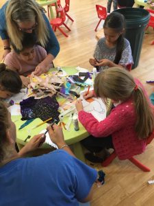Kids with colouring books