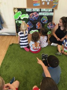 Kids listening to the Very Hungry Caterpillar story