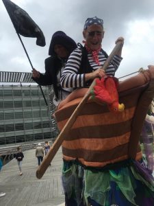 Two men wearing pirate costumes