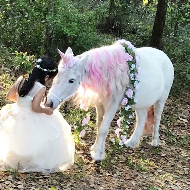 Unicorn | Childrens party London Girl with a pink unicorn